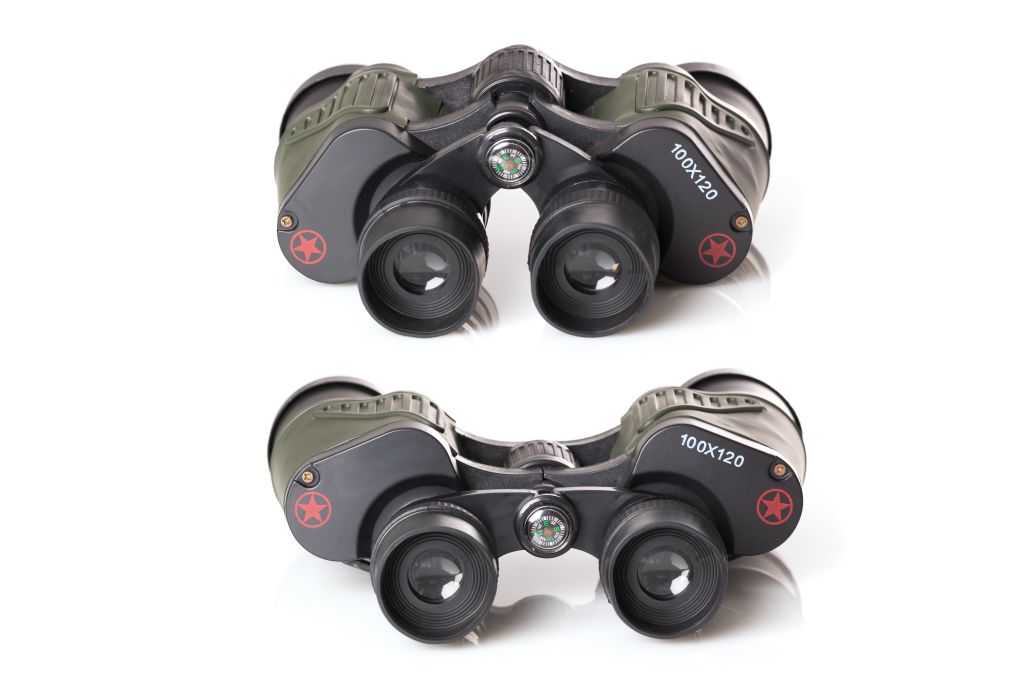 Pair of binoculars on a white background